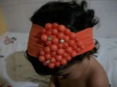Coração com aplicação de meia pérola laranja