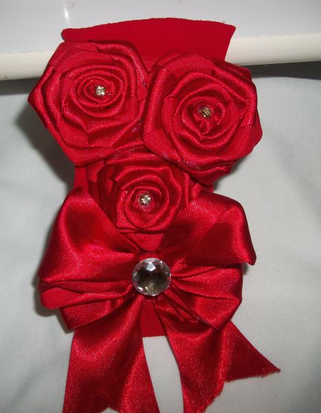 Faixa de meia três rosas um laço